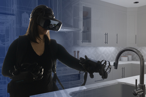 Female team member wearing haptics enabled gloves with tactile feedback, with kitchen in background fading into the digital environment.. 